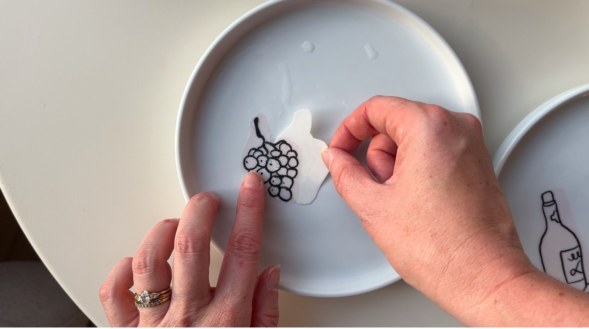 Applying a food-safe ceramic transfer onto a white side plate